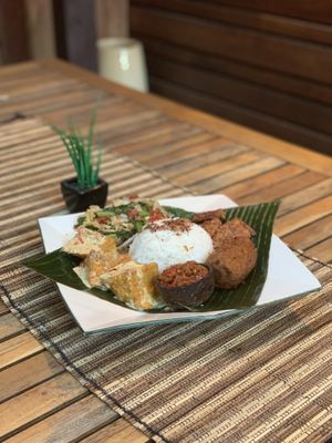 Nasi Campur Vegan
Spicy coconut tofu, potato kroket, tempe & coconut spiced vegetables at The Uleg in Brunswick