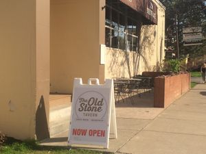 Outdoor seating on south Ave  at The Old Stone Tavern in Rochester