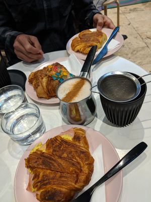 Tofu scramble & bacon croissant, almond croissant and ham & cheese croissant with a chai latte :) at Weirdoughs in Melbourne