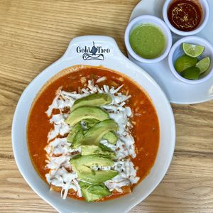 enchiladas rojas - veganas - con aguacate   at Gold Taco - Roma Norte in Mexico City