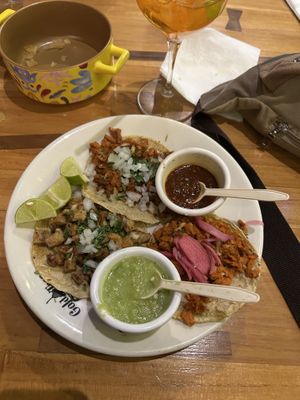 Three types of tacos with added vegan cheesee  at Gold Taco - Roma Norte in Mexico City