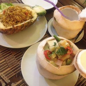 vegan curries in a pineapple and in a coconut + fresh coconut water - yum! at Taste from Heaven in Chiang Mai