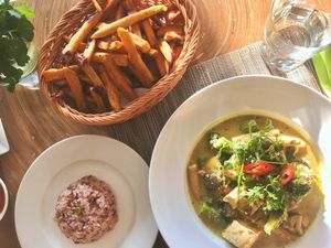 Khmer style tofu which is tofu baked in a marinade of chilli, garlic, turmeric, galangal, lemongrass, kaffir lime leaves & coconut milk (served with brown rice & bok choy) - best! at The Spice House in Phu Quoc