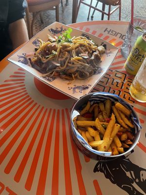 Vegan chow mein (wild mushroom and tofu) and salt and chilli chips. The tofu in this chow mein might have been the highlight of the whole meal!   at Wok Inn in Blackpool