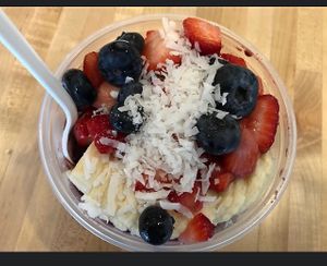 Berries with banana blueberry strawberry and coconut shred  at SoBol in East Meadow