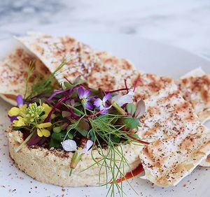 Smoked hummus. Fried chickpeas. Harissa. Za’atar lavash.  at Althea in Chicago