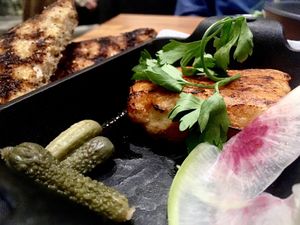 CASHEW RACLETTE with Cornichon and watermelon radish - super yummy! at Althea in Chicago