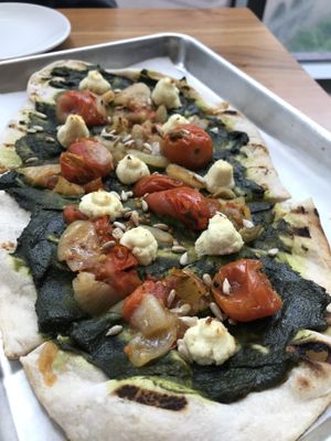 Basil pesto flatbread at Althea in Chicago
