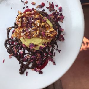 Vegan dessert of the day: date based tarte with orange cashew filling and crunchy caramel  at HOOPS in Mandrem