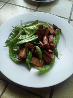 Organic, Stir fried, tofu with snow peas over sprouted wheat berries  at Divine Grace Healing Retreats in Reno