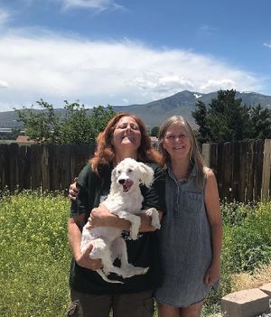 Linda (proprietor) with new vegans Harvest Host RV travelers enjoying massage, and peaceful mountain views, doggie play area, and grooming. Full hook up RV pads 30/50 amps at Divine Grace Healing Retreats in Reno