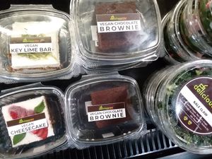 Some To-Go food: vegan desserts and kale slaw at Delicious Raw Kitchen and Juice Bar - Pine Ridge Rd in Naples