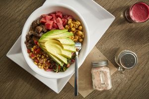 Buddha Bowl
House-made vegan sweet potato pasta, zesty fiesta corn salad, savory marinated portobello mushrooms, tangy kale slaw, roasted candy stripe beets, spiced chickpeas, our  at Delicious Raw Kitchen and Juice Bar - Pine Ridge Rd in Naples
