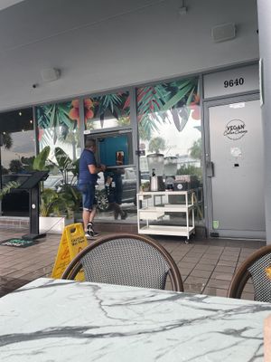 Order+pick up window. Few tables outside   at Vegan Cuban Cuisine in Miami