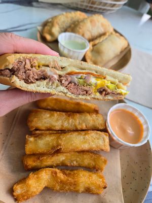 Empanadas, Cuban sandwich, and yuquitas at Vegan Cuban Cuisine in Miami
