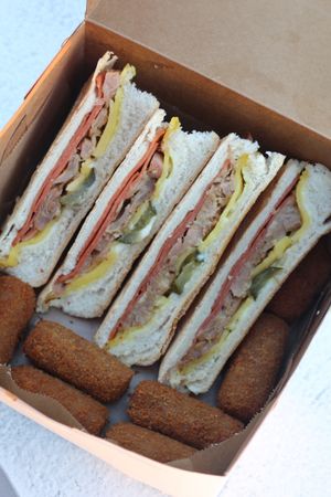 New Cuban Feast Box! Brings 4 Cubano Sandwiches and 7 Ham Croquetas! Yum, Yum! at Vegan Cuban Cuisine in Miami