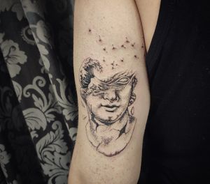 . at SanMan Tattoo Parlor in Madrid