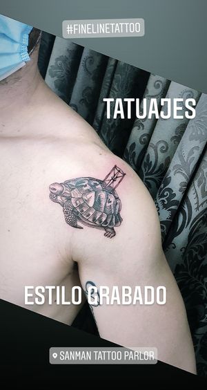 . at SanMan Tattoo Parlor in Madrid