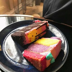 Fluffy chocolate cake🍫 and rainbow cake 🌈 at Deer Mama in Amsterdam
