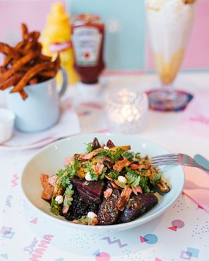 Lentil Salad with roasted parsnip, smoked beetroot, green herb dressing & bacon bits at Deer Mama in Amsterdam