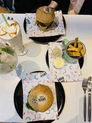 Moscow mule, banana shake with rum. Fries with mayo and mayo truffel. Burger falafel and a BBQ one.  at Deer Mama in Amsterdam