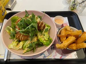 Chicken burger as a salad and cassave fries (both nice, especially the fries). at Deer Mama in Amsterdam