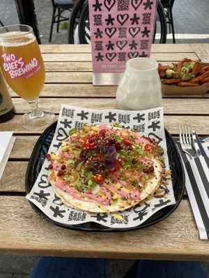 Quezedilla with vegan mince sauce and hot peppers at Vegan Junk Food Bar - Downtown in Amsterdam