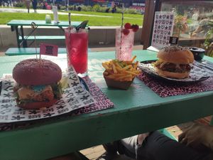 From left to right: Daddy Burger, Galaxy Lemonade, French Fries, Pinky Tonic, Heppi Ribs Burger at Vegan Junk Food Bar - Downtown in Amsterdam