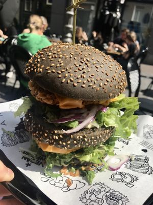 Chik’n Burger with black bun  at Vegan Junk Food Bar - Downtown in Amsterdam