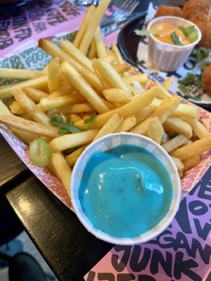 French fries with blue daddy sauce   at Vegan Junk Food Bar - Downtown in Amsterdam