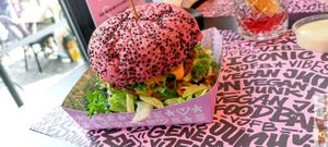 Pink and black burger at Vegan Junk Food Bar - Downtown in Amsterdam