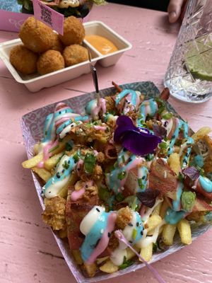 Mac and cheeze betterballs and iconic rainbow fries  at Vegan Junk Food Bar - Downtown in Amsterdam