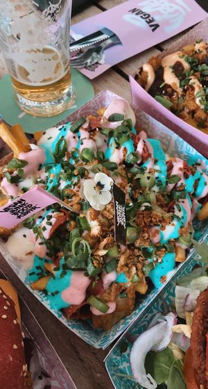 iconic rainbow fries  at Vegan Junk Food Bar - Downtown in Amsterdam