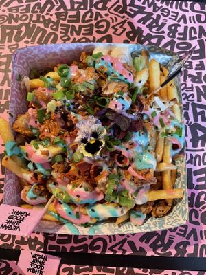 Iconic Rainbow loaded fries   at Vegan Junk Food Bar - Downtown in Amsterdam