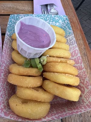 Smiley fries and purple garlic sauce  at Vegan Junk Food Bar - Downtown in Amsterdam