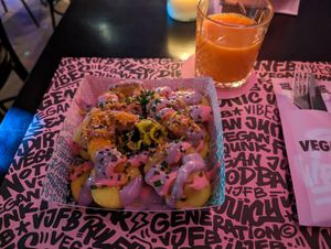 Loaded Zeafood and carrot-ginger juice at Vegan Junk Food Bar - Downtown in Amsterdam
