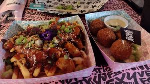 VJFBradwurst loaded fries (w/bbq sauce, garlic sauce & sausage chunks), classic betterballs (best vegan bitterballen I've ever tasted) at Vegan Junk Food Bar - Downtown in Amsterdam