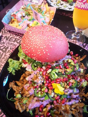 Shawarma Burger and Rainbow Fries at Vegan Junk Food Bar - Downtown in Amsterdam