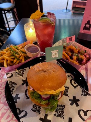 burger, fries, onion rings & mocktail  at Vegan Junk Food Bar - Downtown in Amsterdam