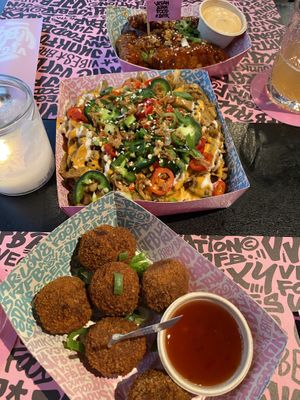 Crunchy pnut Thai betterballs and fries with kebab, cheesey sauce and chilles   at Vegan Junk Food Bar - Downtown in Amsterdam