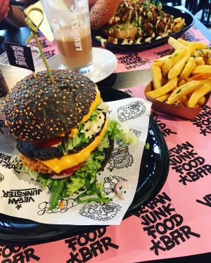Daddy Mc Chik’n Double chicken burger & fries 💜 at Vegan Junk Food Bar - Downtown in Amsterdam