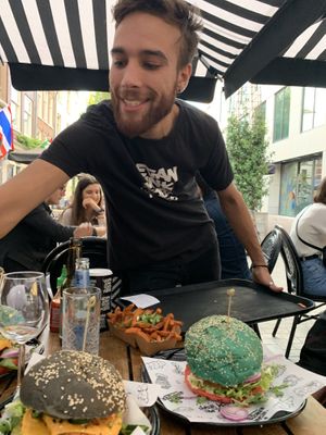 Cheeky waiter clocked us ‘Meerkating’ the door for our order and walked by pretending it wasn’t for us, just to build the anticipation!  at Vegan Junk Food Bar - Downtown in Amsterdam