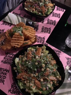 Ceasar Salad and Waffel Fries at Vegan Junk Food Bar - Downtown in Amsterdam