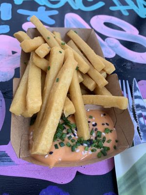 Chickpea fries with house sauce at Vegan Junk Food Bar - Downtown in Amsterdam