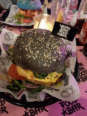Notorious sumo (black bun) and Daddy mc chickn(blue and pink bun) at Vegan Junk Food Bar - Downtown in Amsterdam