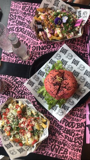 Truffle Fries-Daddy Chicken-Rainbow Fries at Vegan Junk Food Bar - Downtown in Amsterdam