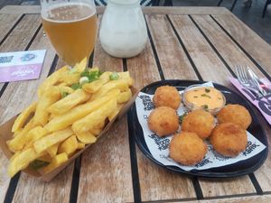 Mac and cheese balls and fries at Vegan Junk Food Bar - Downtown in Amsterdam