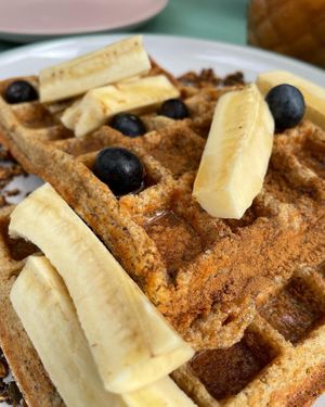 Waffles with banana, berries, cinnamon and maple syrup at Jay's Brunch Caffe in Parede