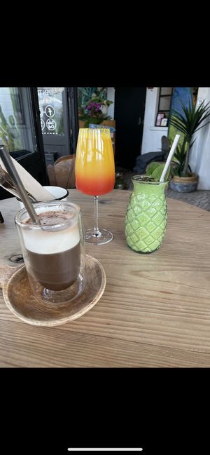 Vegan mocha, mimosa with fresh squeezed OJ, and a vegan smoothie  at Jay's Brunch Caffe in Parede