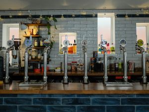 Fully stocked bar including craft beer on draught and locally-roasted coffee at The Treehouse Board Game Cafe in Sheffield